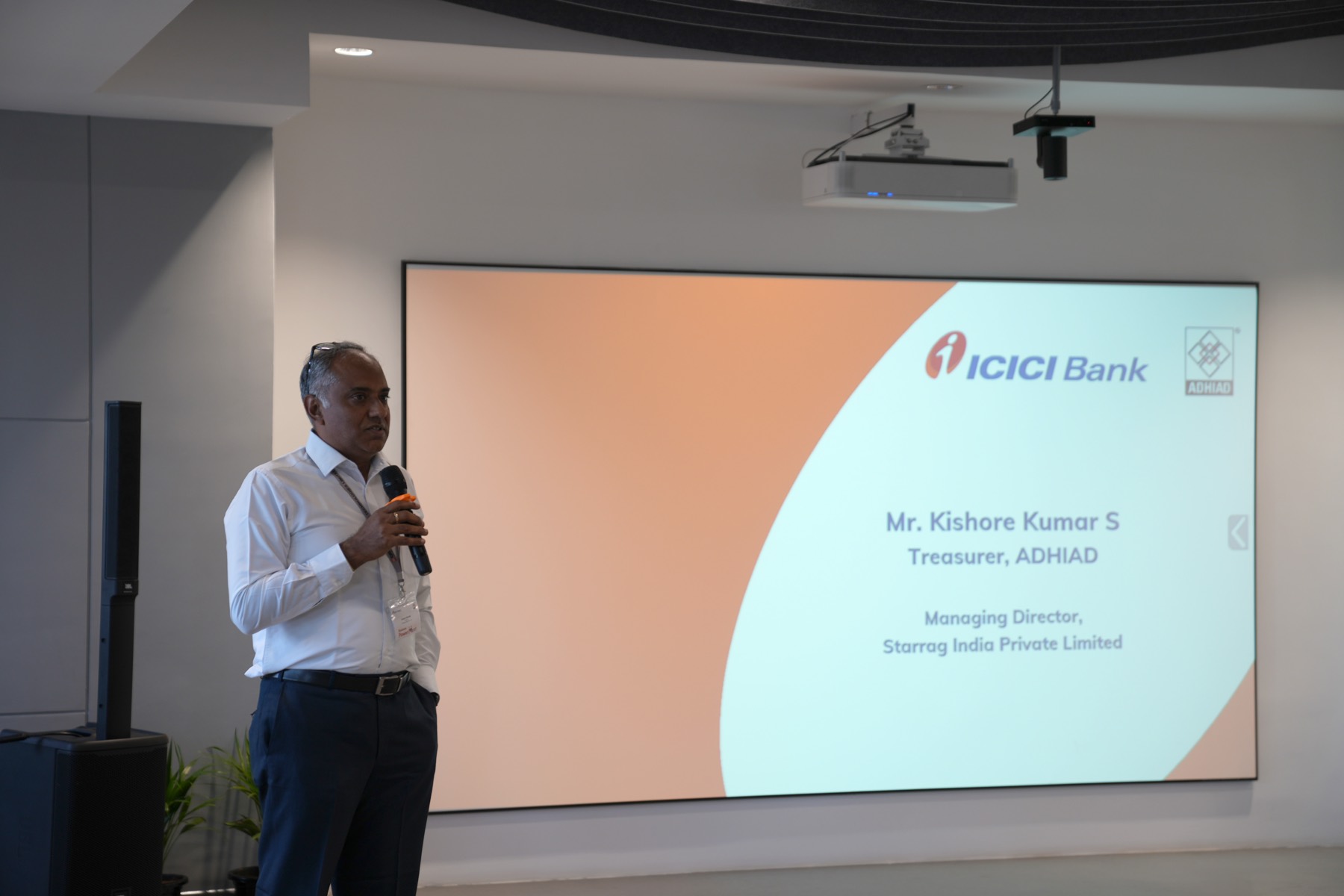 Kishore Kumar S, Treasurer of ADHIAD, speaks during the educational session.