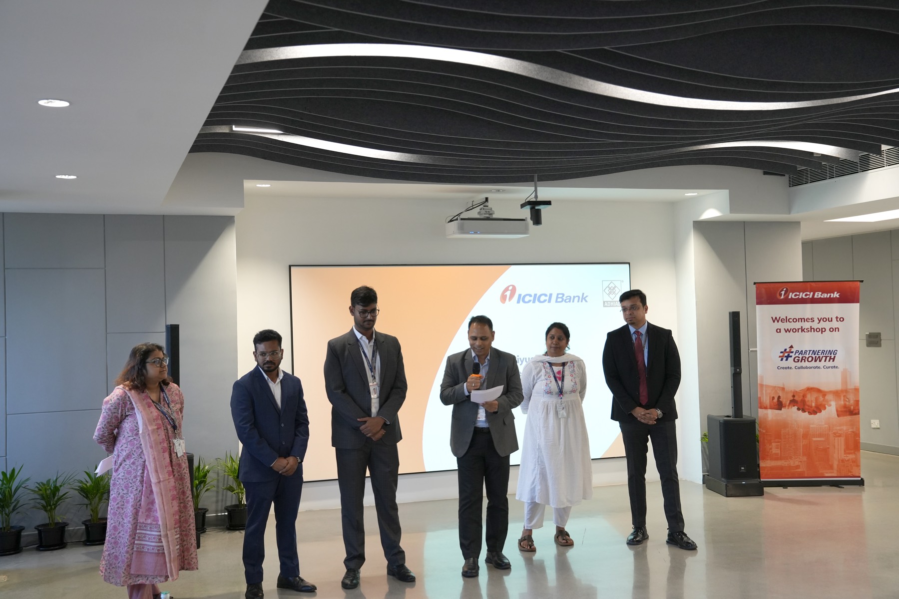 The hosting team with the ICICI Bank workshop banner at Dynamatic Technologies Limited, Bangalore.